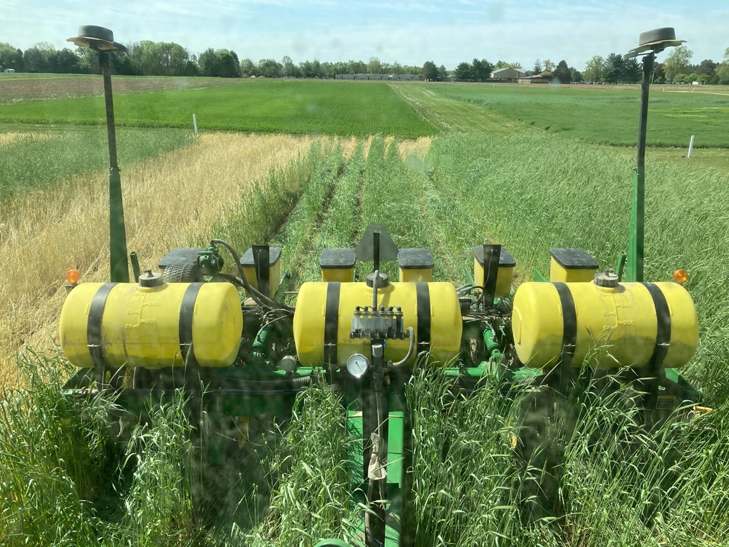 Planting soybeans in 30” rows into a cereal rye cover crop in late May (Photo Credit Brook Wilke)